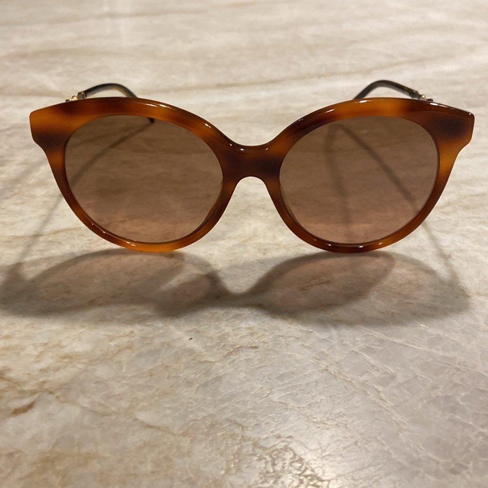 Women’s Gucci sunglasses.